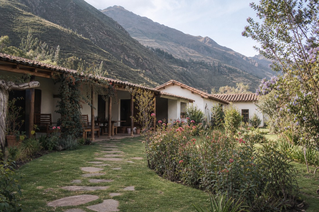 Green fields and mountains of the Sacred Valley near Urubamba, Peru, the region around this center